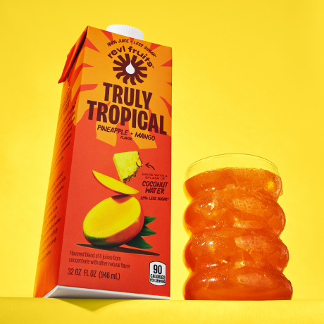 truly tropical carton with glass